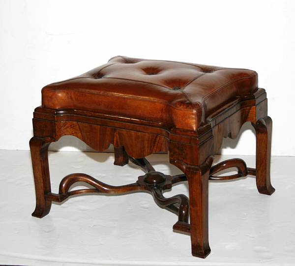 Appraisal: A Queen Anne style walnut and leather upholstered stool height