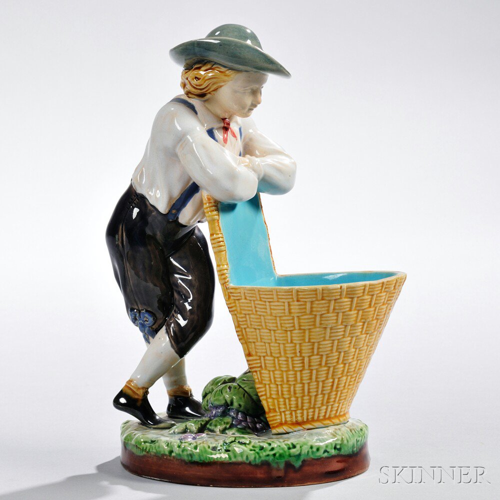 Appraisal: Minton Majolica Figure England c modeled as a boy resting