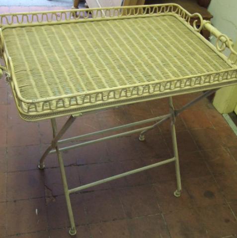 Appraisal: A cream painted woven metal galleried tray on folding stand