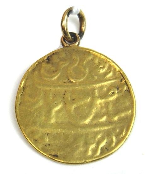 Appraisal: An Indian gold Mohur mounted with a suspension ring gross