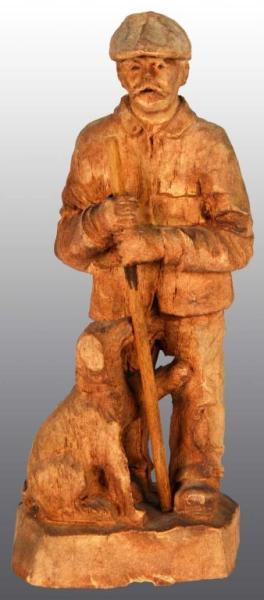 Appraisal: Carved Wooden Figure of Man with Dog Description Some chips