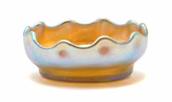 Appraisal: A Tiffany Favrile Glass Salt of circular form with ruffled