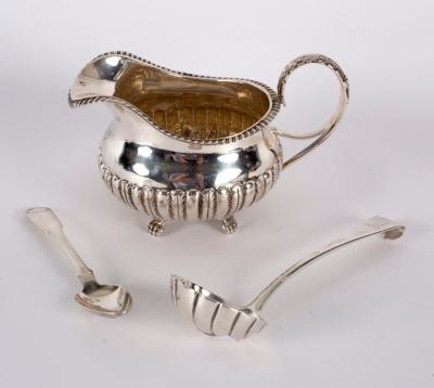 Appraisal: An Irish silver jug James le Bas Dublin with gadrooned