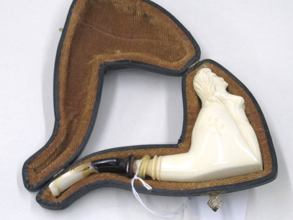 Appraisal: Carved ivory pipe in case modelled as a naked lady