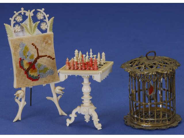 Appraisal: Lot Three Dollhouse Miniatures MN Includes carved bone game table