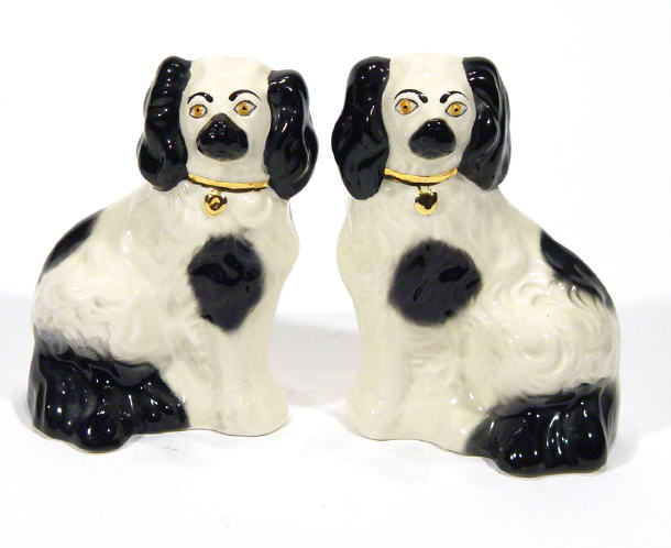 Appraisal: Small hand painted pair of Beswick black and white Staffordshire