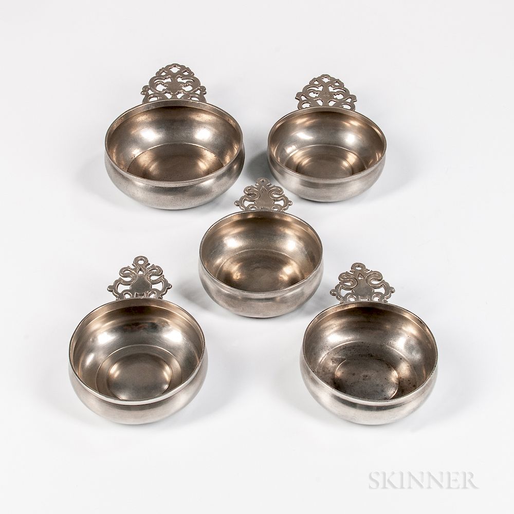 Appraisal: Five New England Pewter Porringers Five New England Pewter Porringers