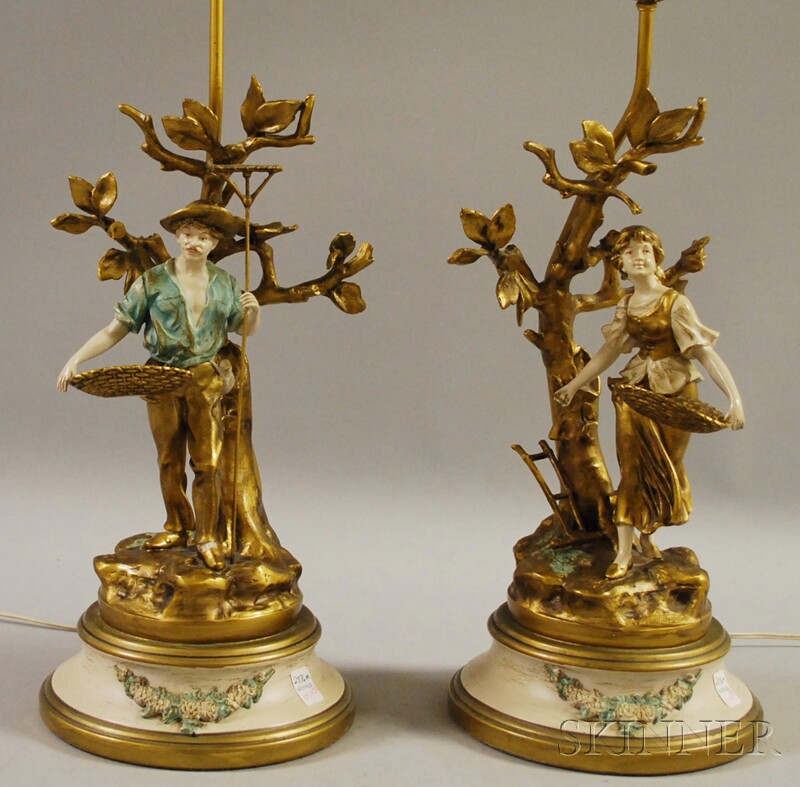 Appraisal: Pair of Painted French-style Metal Figural Peasants Picking Fruit Table