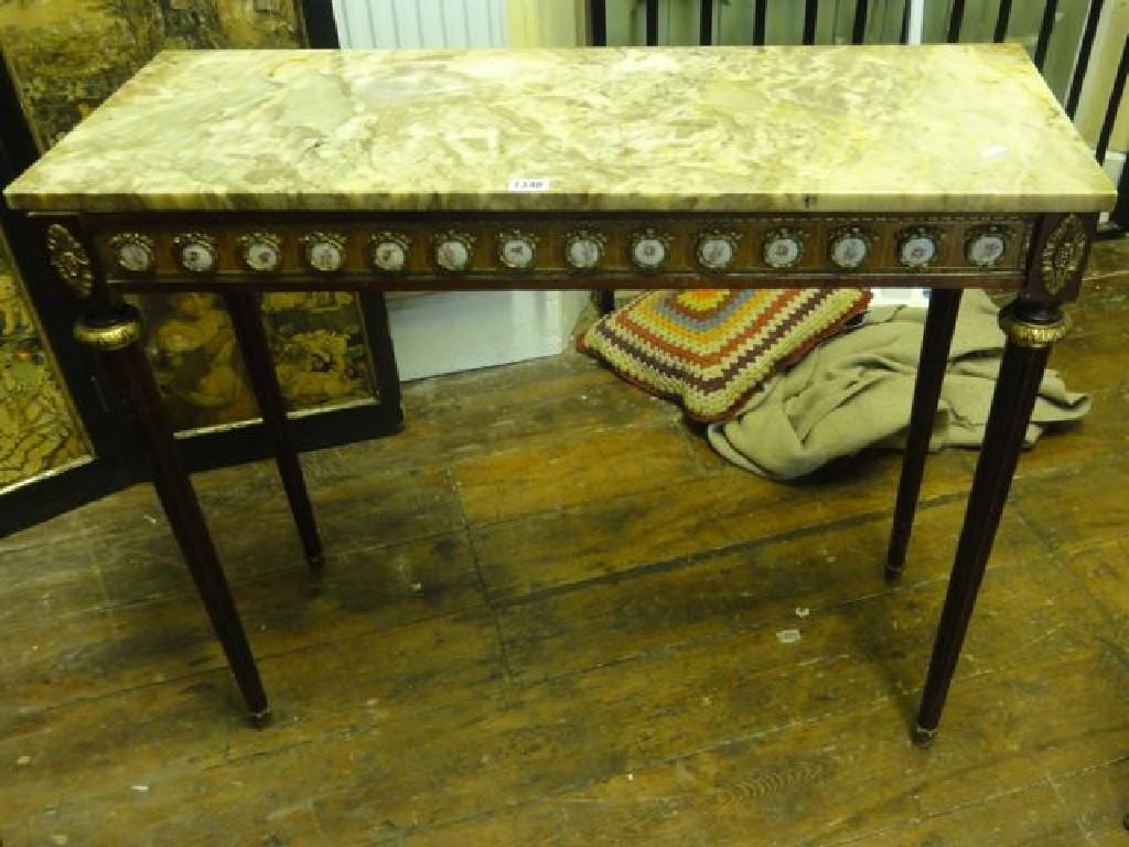 Appraisal: A hall pier table with rectangular coloured marble top raised