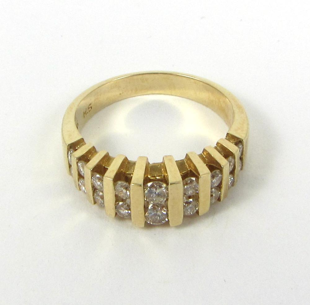 Appraisal: DIAMOND AND FOURTEEN KARAT GOLD RING with nine pairs of