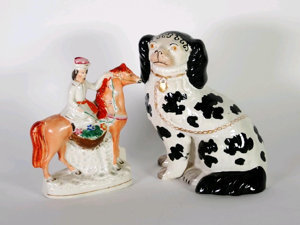 Appraisal: TH CENTURY STAFFORDSHIRE FLAT BACK POTTERY EQUESTRIAN FIGURE PAINTED IN