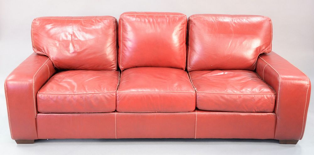 Appraisal: Red leather sofa with matching chair and footstool ht wd