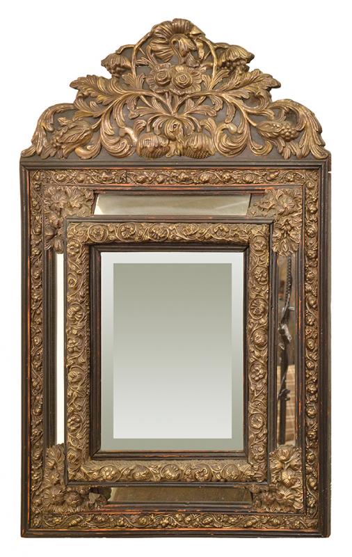 Appraisal: A FRENCH CUSHION FRONT WALL MIRROR the projecting bevelled rectangular