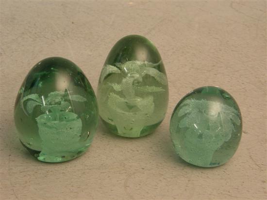 Appraisal: Three Green glass Dump paperweights h in