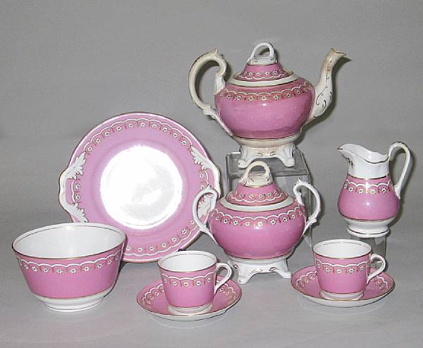 Appraisal: An English porcelain tea service mid th century Each decorated