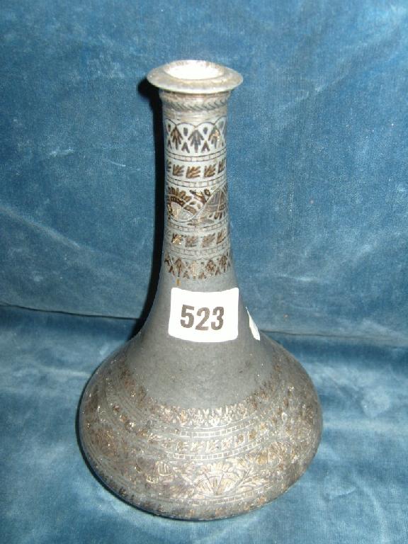 Appraisal: A Persian pewter vase with drawn neck and silver chip