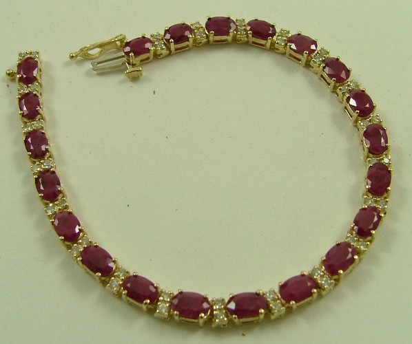 Appraisal: RUBY AND DIAMOND LINE BRACELET K yellow gold set with