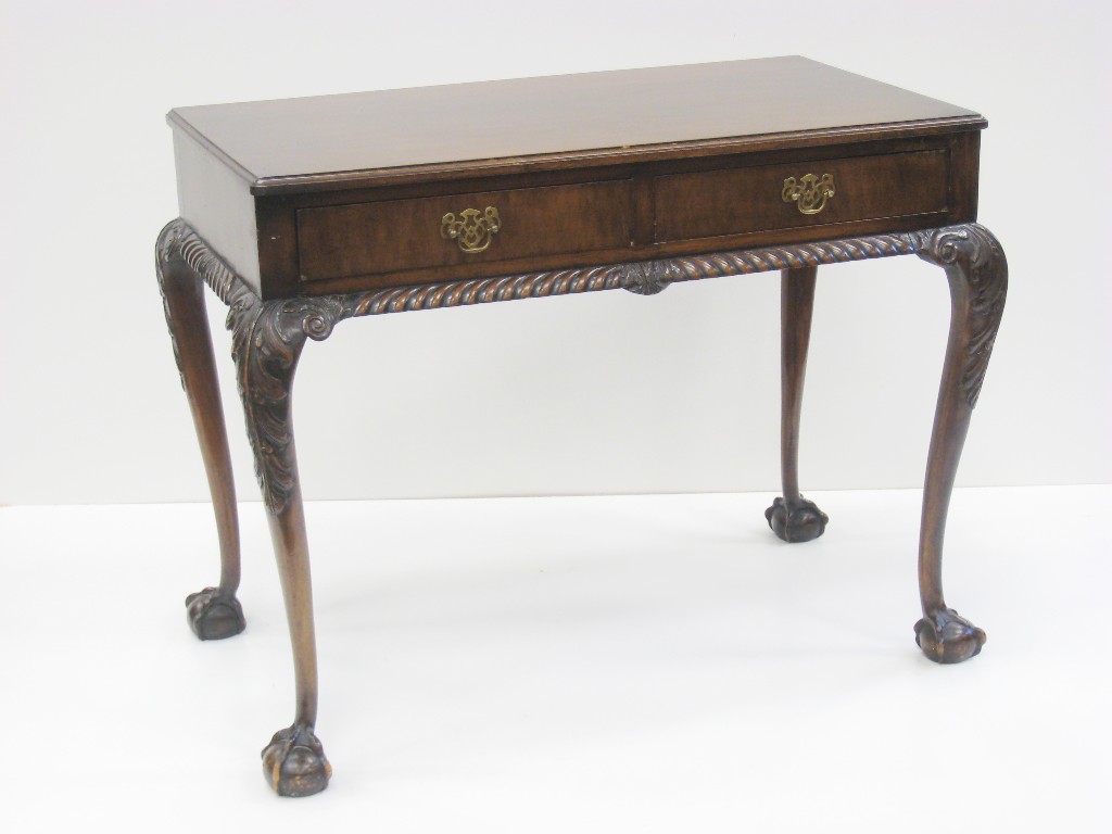 Appraisal: A Chippendale style mahogany Serving Table fitted two drawers gadroon