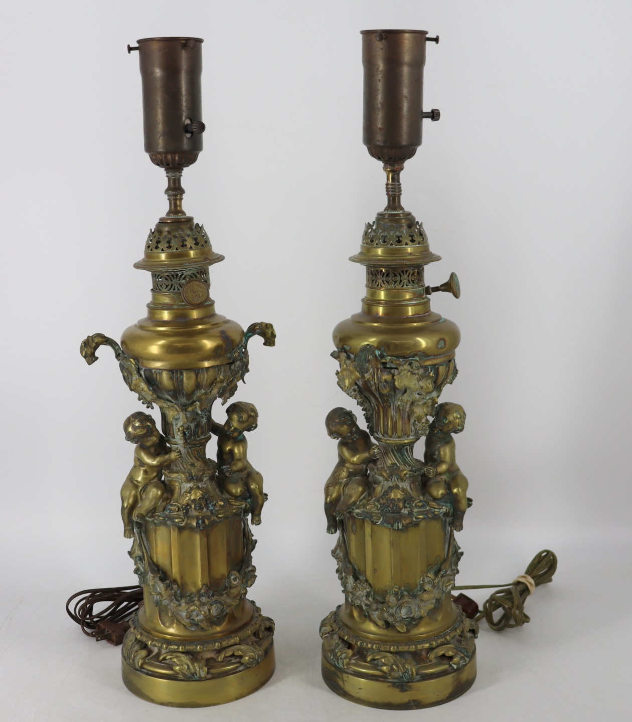 Appraisal: PAIR OF BRONZE GEBRUDER BRUNNER-WIEN FIGURAL LAMPS Column form Gebruder