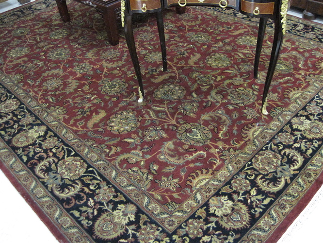 Appraisal: HAND KNOTTED ORIENTAL CARPET Persian Kashan design with overall floral