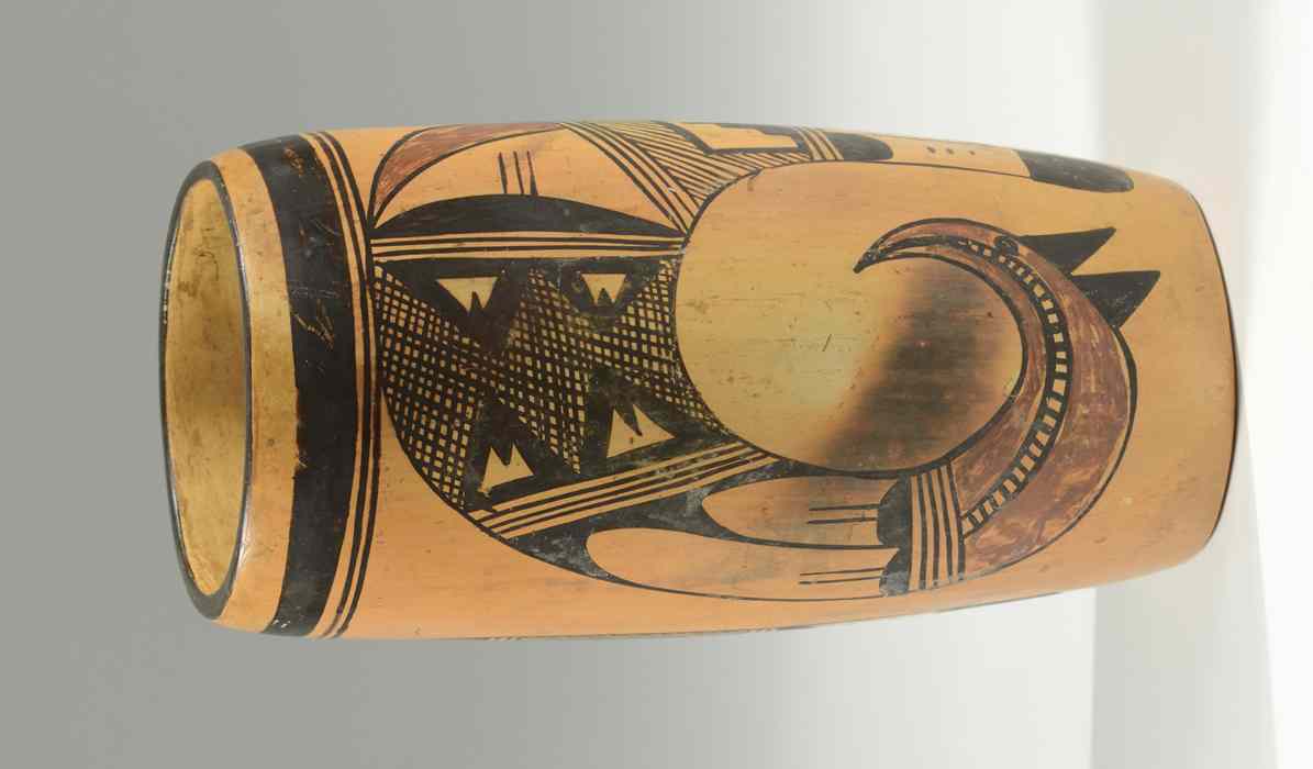 Appraisal: HOPI POTTERY CYLINDRICAL VASE having two hand painted stylized parrots