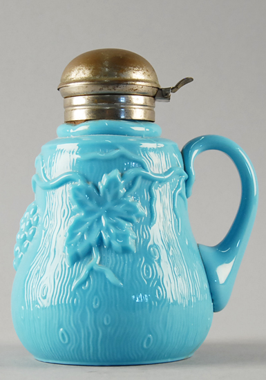 Appraisal: An Unattributed Blue Milk Glass Syrup Pitcher molded with relief