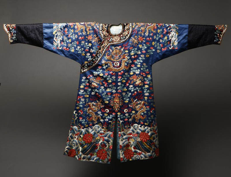 Appraisal: A Chinese embroidered blue silk kesi robe dragons A Chinese