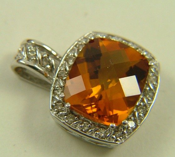 Appraisal: CITRINE AND DIAMOND PENDANT NECKLACE K white gold setting estimated