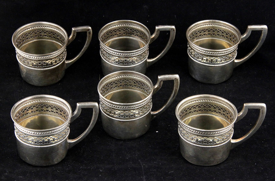 Appraisal: A set of six German white metal cup holders Wilhelm