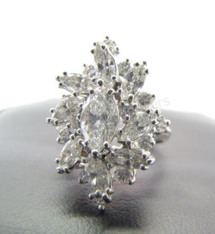 Appraisal: A K white gold lady's cluster ring with nine marquis