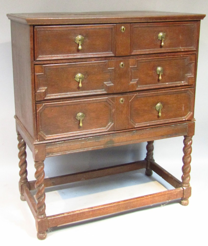 Appraisal: A William Mary style oak chest of three long drawers