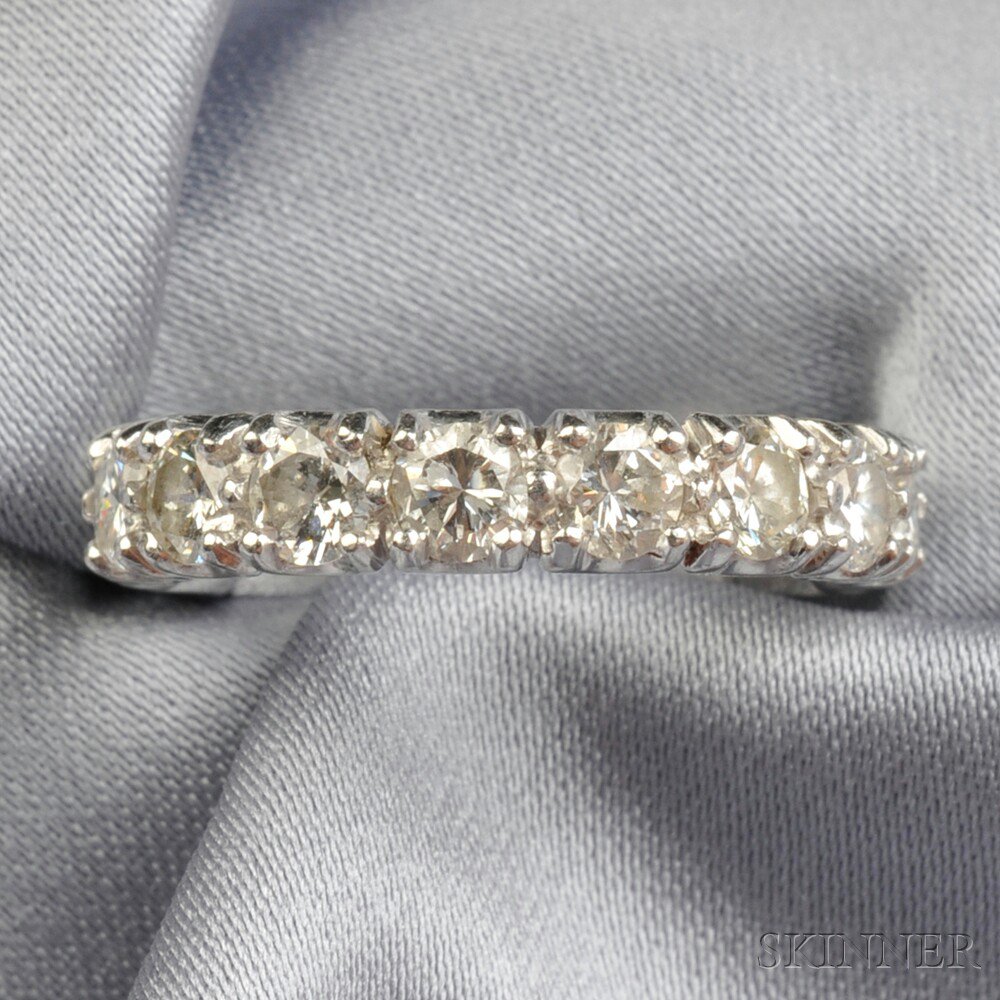 Appraisal: Platinum and Diamond Eternity Band set with sixteen full-cut diamonds