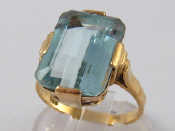 Appraisal: A yellow metal tests carat gold aquamarine ring the aquamarine