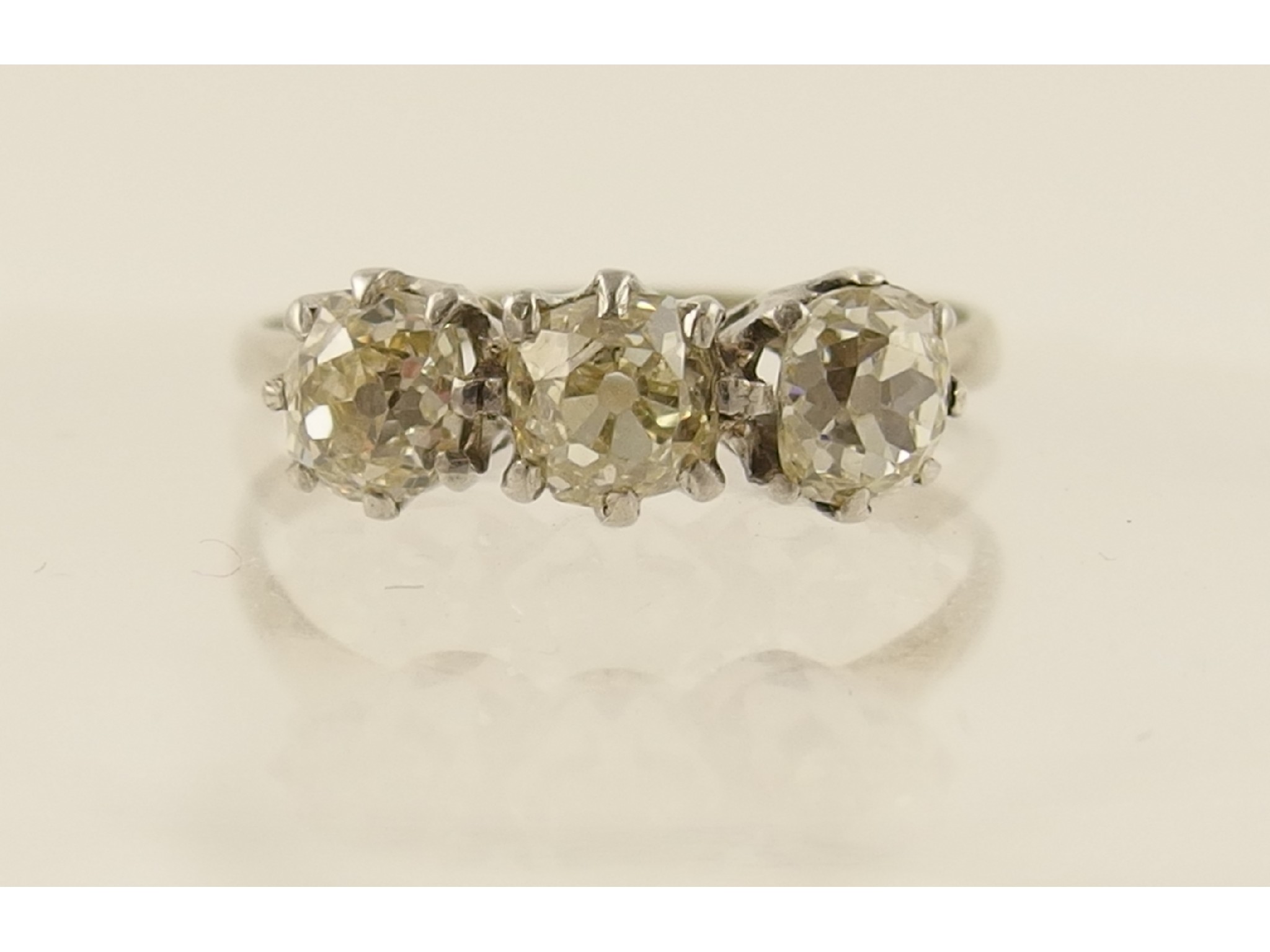 Appraisal: An ct and platinum three stone old cut diamond ring