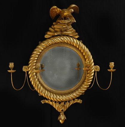 Appraisal: REGENCY CARVED GILTWOOD CONVEX MIRROR The plate with reeded inner