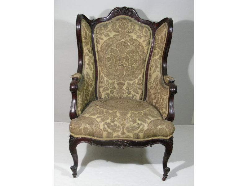 Appraisal: Rococo Revival Wing Chair th c mahogany frame with gold