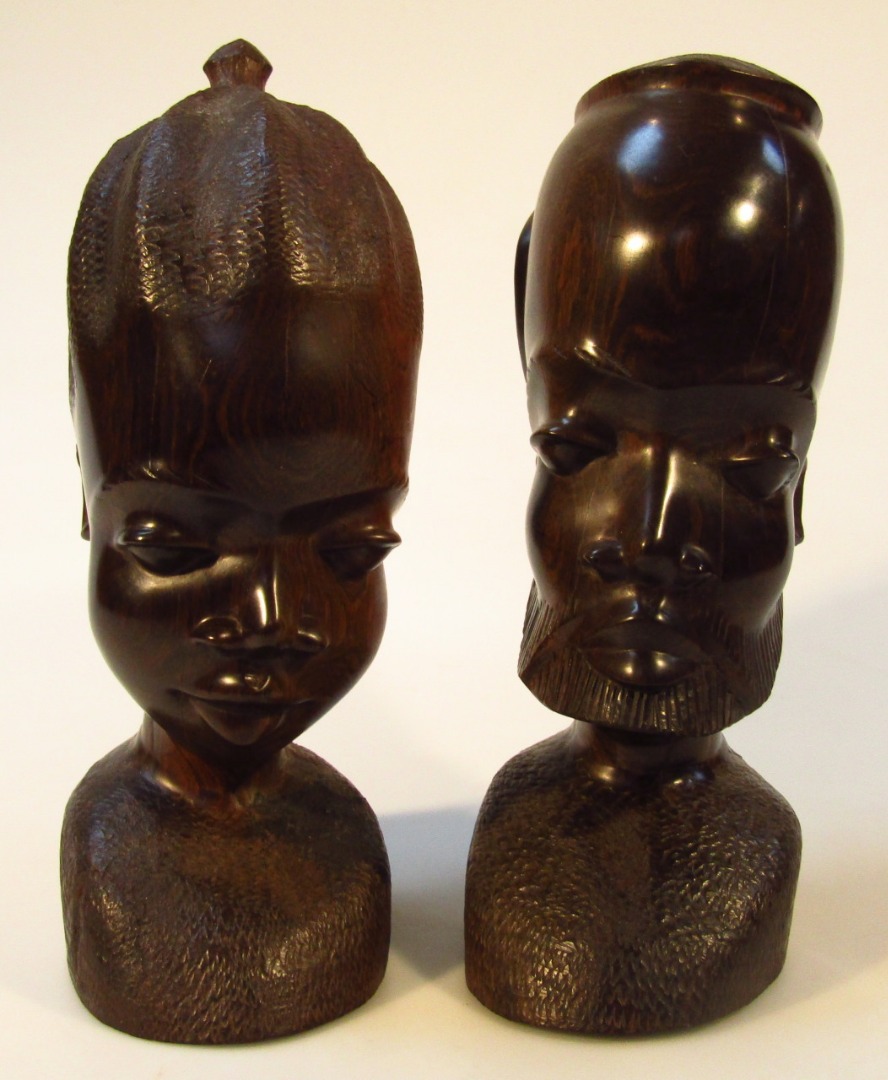 Appraisal: A pair of thC African carved tribal hardwood heads of