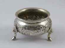 Appraisal: A Russian silver cauldron salt on three feet Fyedor Petrov