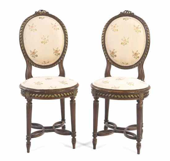 Appraisal: A Pair of Louis XVI Style Parcel Gilt Side Chairs