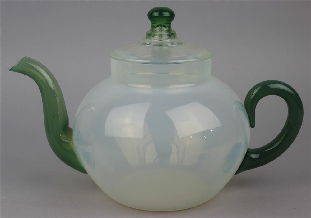 Appraisal: OPALESCENT GLASS TEAPOT AND COVER th C probably Fry Glass