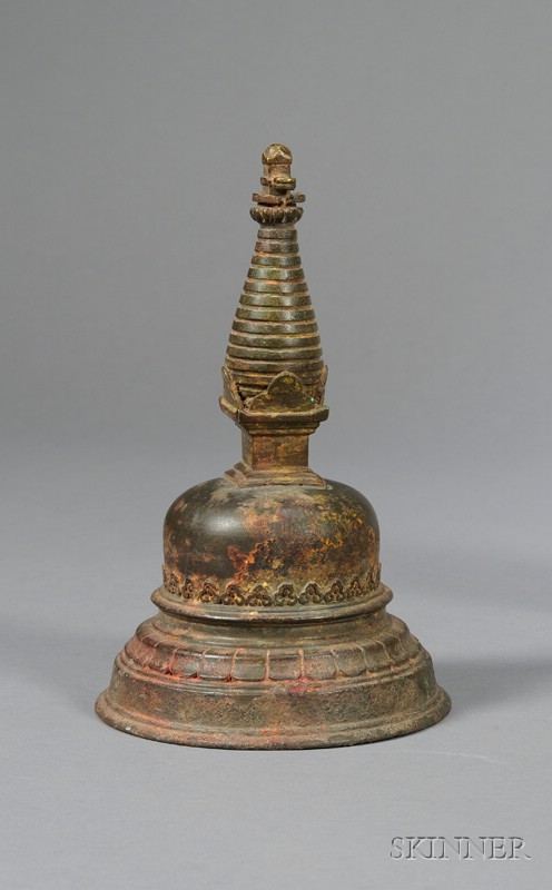 Appraisal: Bronze Buddhist Votary Nepal th century stupa with traces of