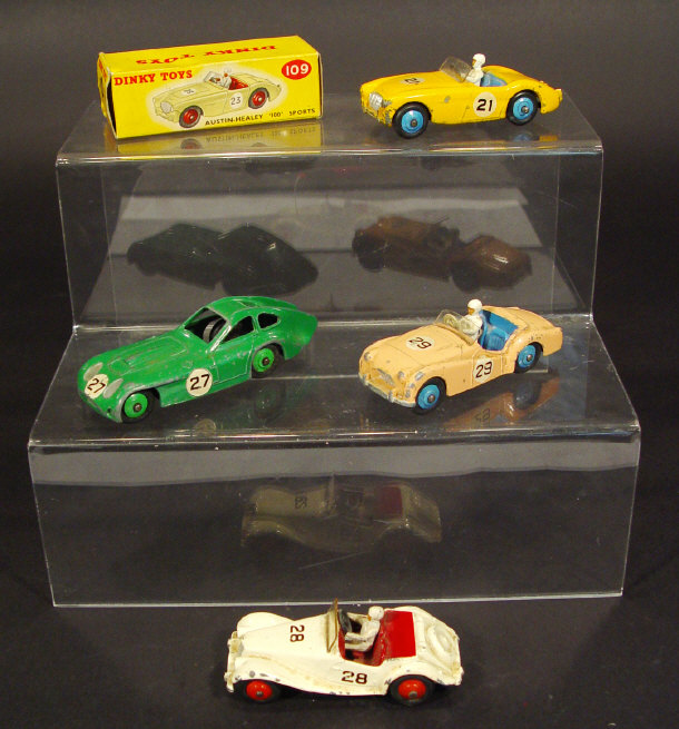 Appraisal: Four Dinky Toys die-cast British open top racing cars comprising