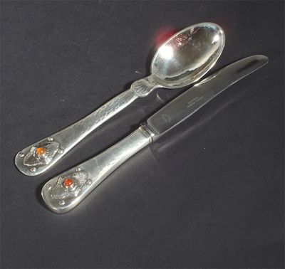 Appraisal: A Georg Jensen silver spoon and knife each set with