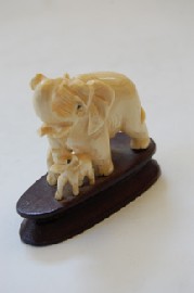 Appraisal: CARVED IVORY ELEPHANT AND BABY ELEPHANT