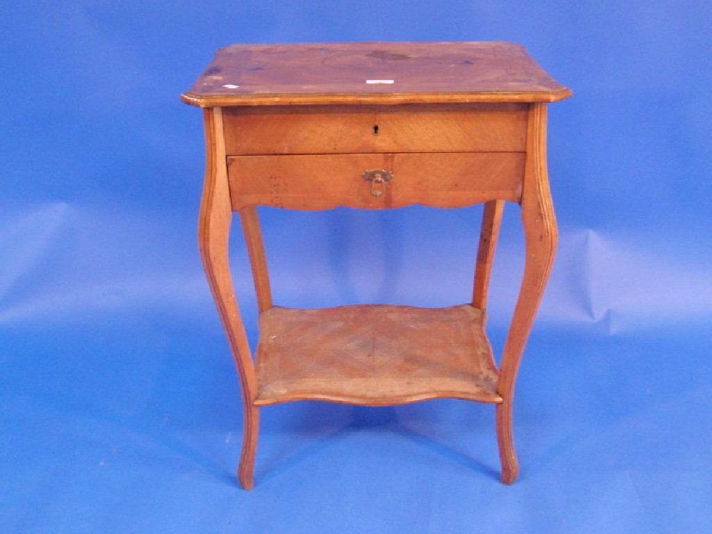 Appraisal: An early th century French walnut quarter veneered work table