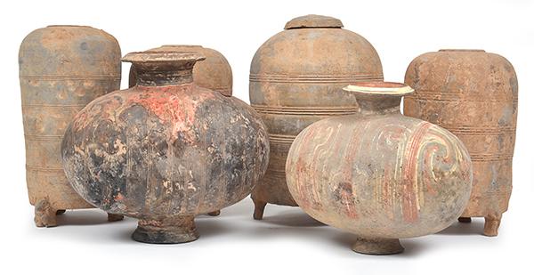 Appraisal: A COLLECTION OF SIX HAN EARTHENWARE JARS including two cocoon