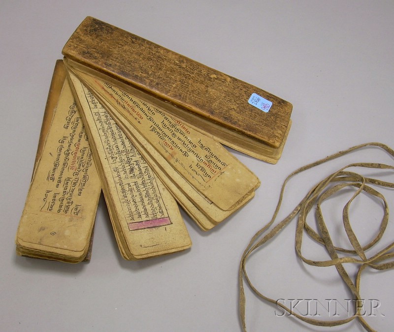 Appraisal: Tibetan Prayer Book unbound wooden covers held by leather ht