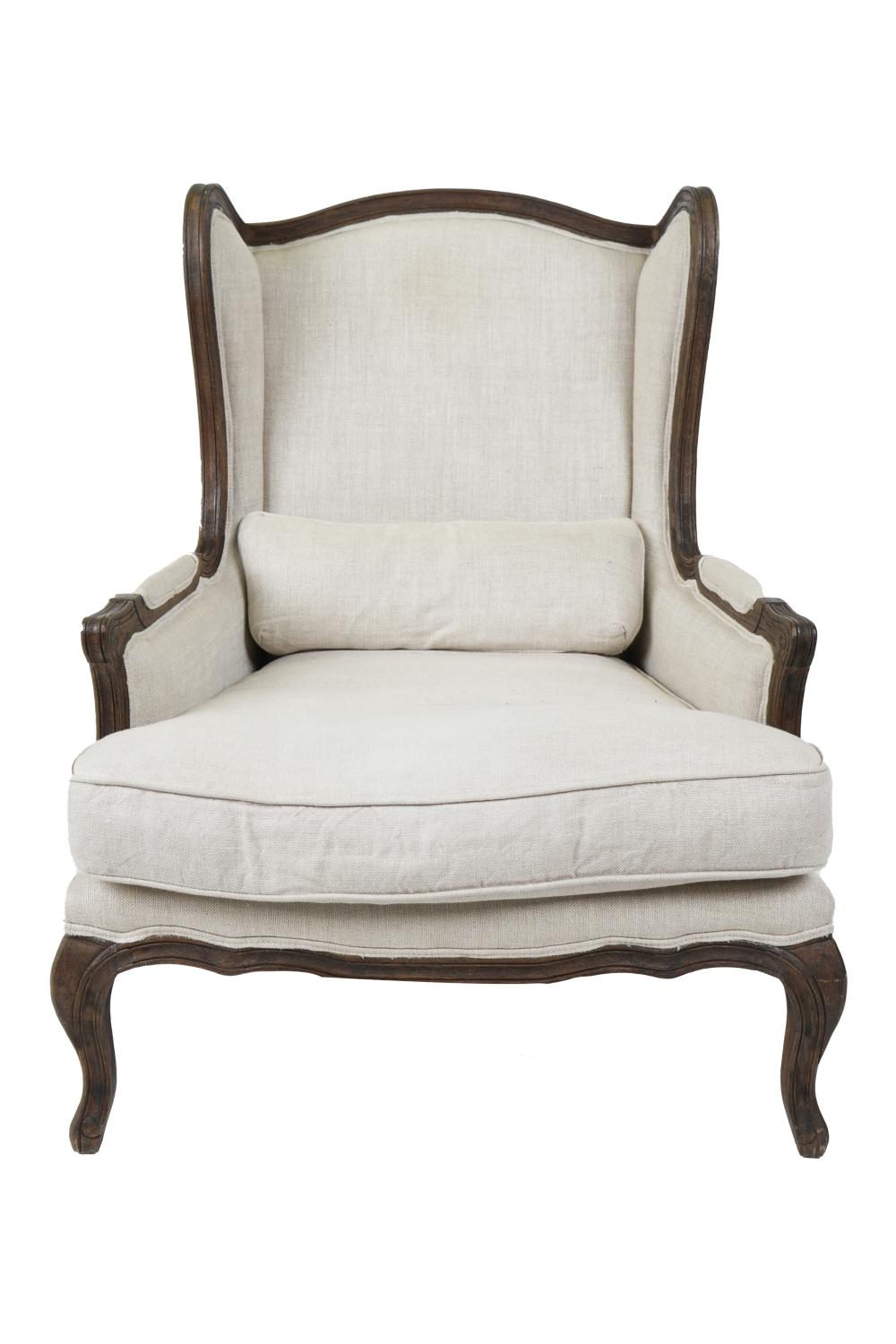 Appraisal: RESTORATION HARDWARE WING CHAIRcarved dark brown-stained carved wood frame and