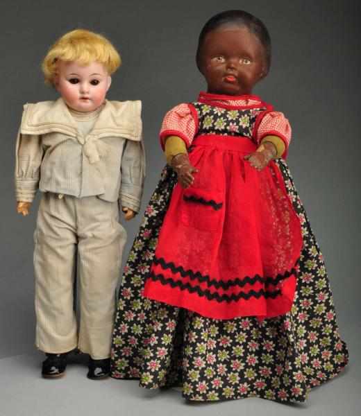 Appraisal: Lot of Early th Century Dolls Description Includes a bisque