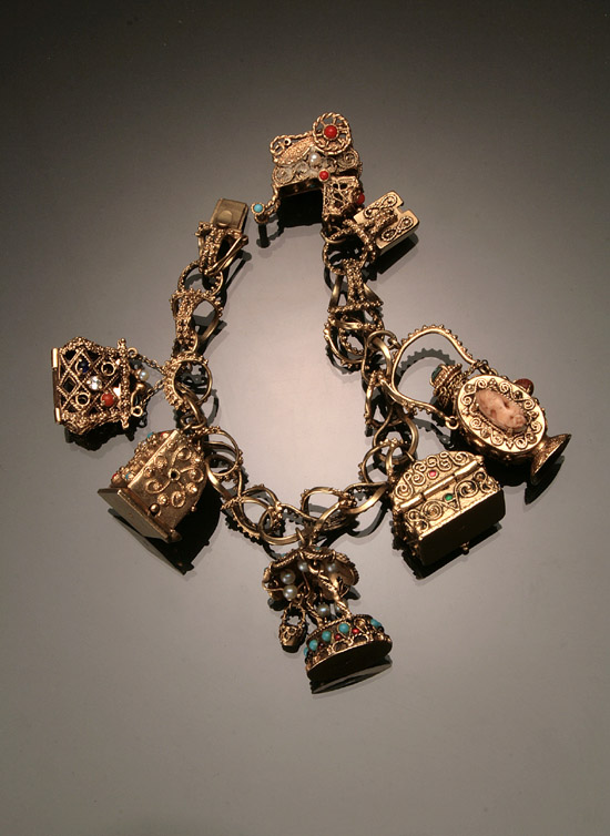 Appraisal: -Karat Yellow-Gold Charm Bracelet Suspending six -karat yellow-gold and semi-precious